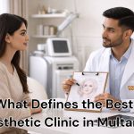 Doctor performing aesthetic consultation at GoldyZ Aesthetics clinic in Multan